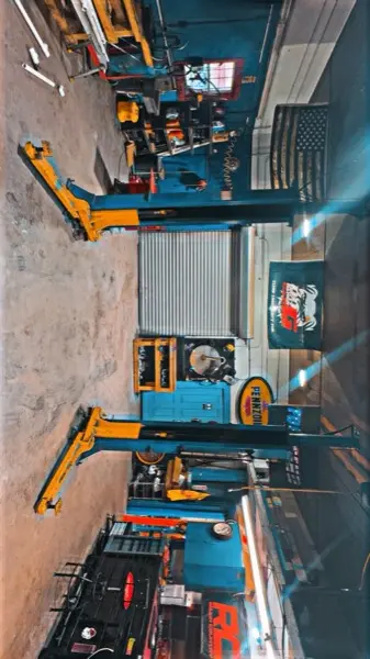 Inside Dirty Dawgs Garage - professional auto repair shop with lifts and equipment in St. Augustine FL